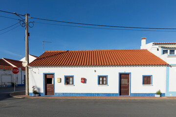 scenic typical house with post office in Sao Teotonio at the coast