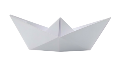 Close-up of a neatly folded white paper boat against a black background