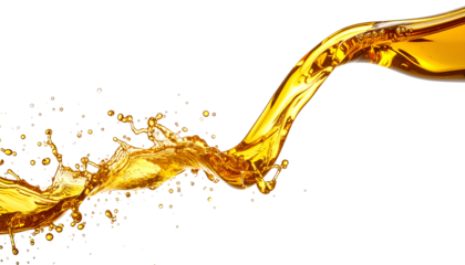 Stream of golden liquid pours and splashes against a dark background, creating dynamic shapes