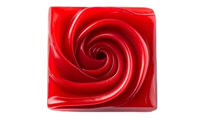 Square red object with a glossy finish resembling a swirling rose