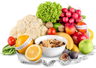 Diet weight loss breakfast concept with tape measure, fruit and cereal