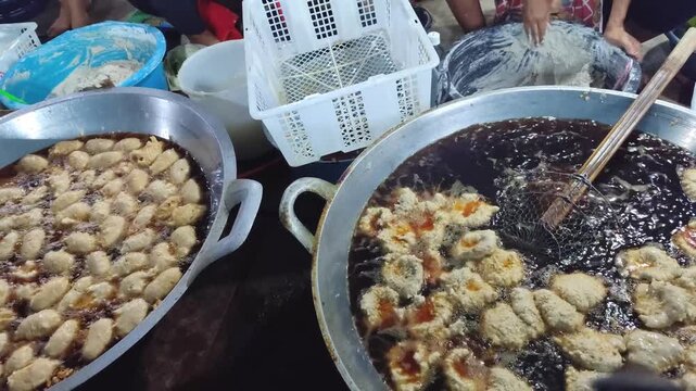 Pempek is fried and served with a sweet and sour sauce called kuah muka (vinegar sauce). Pempek is an Indonesian (Palembang) dish.