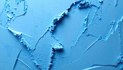 Abstract close up texture of vibrant light blue cosmetic powder creating dramatic shadows and rough surface details perfect for modern background design elements