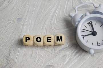 Concept of text poem on wooden letter blocks.