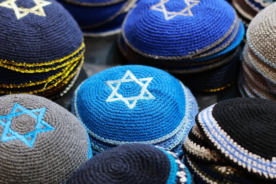 Knitted Jewish kippahs with Star of David pattern