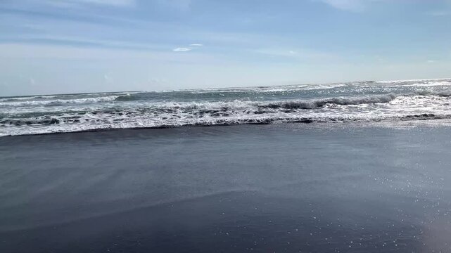 Powerful Ocean Waves Crashing on Parangtritis Beach Coastline