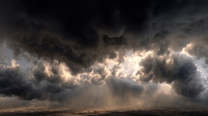 Dark storm clouds fill the sky above the ocean as rain begins to fall. The light from the setting sun breaks through the clouds creating a striking visual effect.