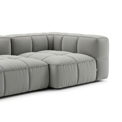 Fototapeta premium Minimalist Light Gray Tufted Sectional Sofa With Clean Lines And Geometric Design Isolated On A White Background Studio Shot