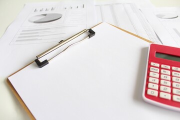 Blank paper for quote inserting with pen, paper, calculator and documents. Photo concept for organisation and company, business, finance, reporting, audit, student, design, education and advertising.