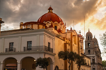 Historic Santa Vera Cruz Temple and Cathedral architecture in Toluca, Mexico, downtown at sunset