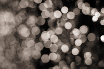 Obraz premium Beautiful abstract bokeh of soft twinkling lights in overlapping circles, suitable for graphic design and banners.