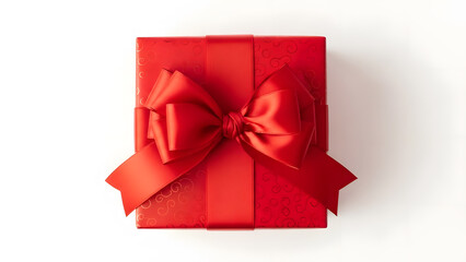 Top view of a red square gift box with a large ribbon bow on a white background