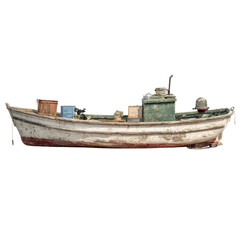 Old weathered fishing boat with cargo on a black background
