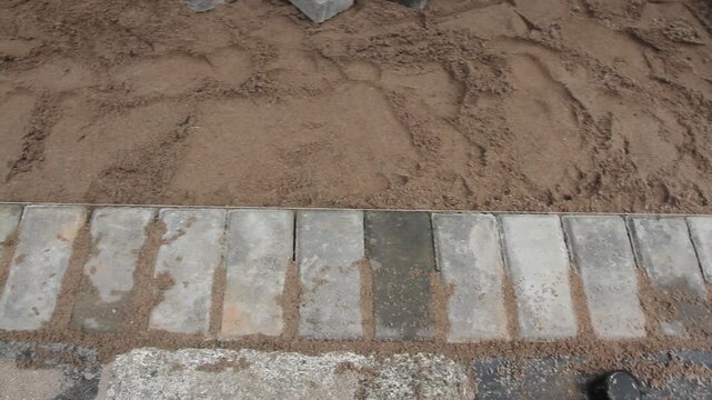 Interlocking paving stones installation is on progress.