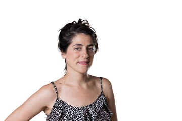 Woman with wry smile on white background.