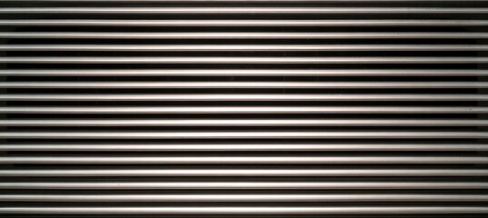 Obraz premium 縞模様の金属製の表面が見える場所