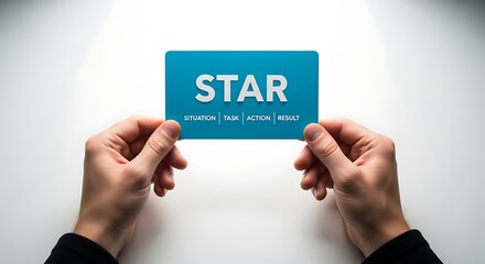 Hands holding blue card displaying star method acronym for structured behavioral interview answers