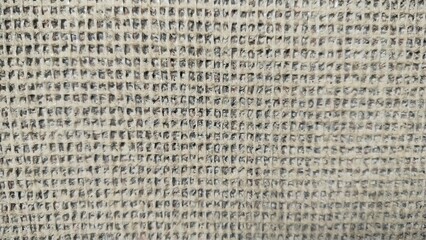 The texture of the back of the mat. Natural linen texture as background. texture weave natural fabric waffle