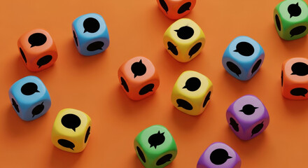 Obraz premium Top view of vibrant dice with speech bubbles scattered on an orange background, conveying a playful communication concept and message exchange.