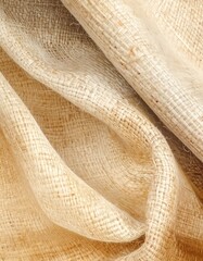 Close-up of draped woven fabric, featuring light and shadow play