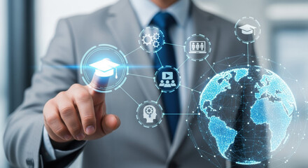 A businessman in a gray suit interacts with a digital globe and glowing education icons, symbolizing global online learning and technological advancement.