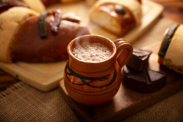 Rosca de Reyes, also called Three Kings Bread, Roscon, Epiphany Cake, traditionally served with hot chocolate in a clay Jarrito. Mexican tradition on January 5th.