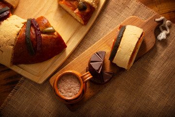 Rosca de Reyes, also called Three Kings Bread, Roscon, Epiphany Cake, traditionally served with hot chocolate in a clay Jarrito. Mexican tradition on January 5th.