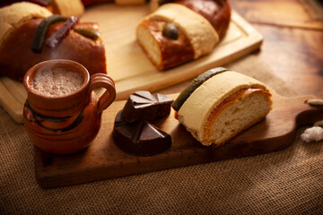 Rosca de Reyes, also called Three Kings Bread, Roscon, Epiphany Cake, traditionally served with hot chocolate in a clay Jarrito. Mexican tradition on January 5th.