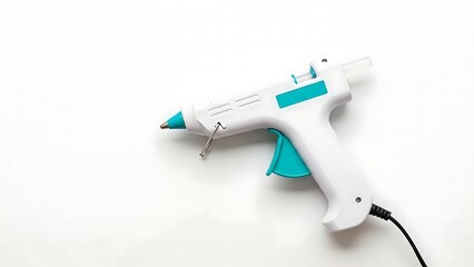 Fototapeta premium White and Blue Hot Glue Gun on White Background for Crafting and Diy Projects