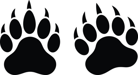 Two black bear paw prints with sharp claws on a white background © Raton