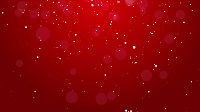 Background with red gradient and glittering particle bokeh creates a sparkling gold and red background falling light particles snow particles on red background 4k motion background