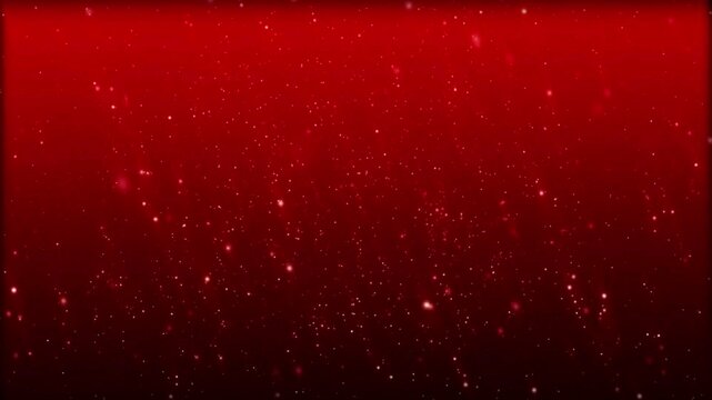 Background with red gradient and glittering particle bokeh creates a sparkling gold and red background falling light particles snow particles on red background 4k motion background