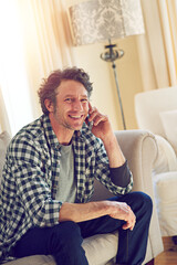 Fototapeta premium Happy man, phone call and portrait on sofa in home, contact and chat in living room at apartment. Mature person, smartphone and smile with conversation, talk or relax on couch at house in New Zealand
