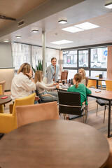 Fototapeta premium Businesswomen meeting coworking discussing strategy collaboration in a stylish modern office.