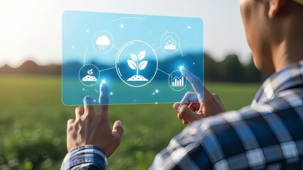 Man interacting with futuristic agricultural technology in green field