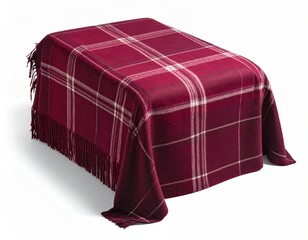 Maroon plaid blanket with fringe draped over a rectangular ottoman
