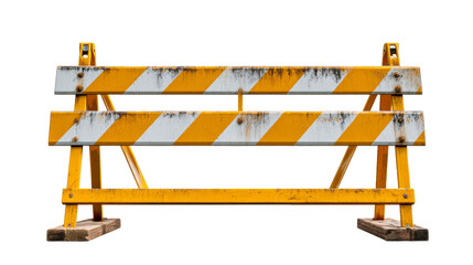 A weathered yellow and white striped construction barrier stands as a symbol of caution and safety, perfect for communicating road work or restricted access in various projects