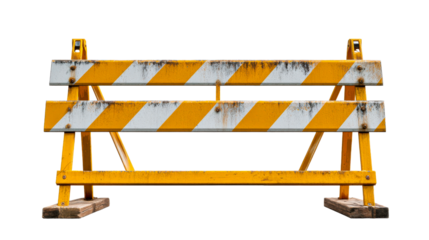 A weathered yellow and white striped construction barrier stands as a symbol of caution and safety, perfect for communicating road work or restricted access in various projects