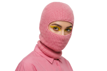 Side view of trendy young woman with creative yellow eyeliner wearing pink knitted balaclava, isolated on a transparent background