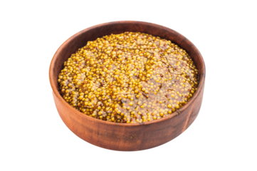 Dijon French mustard with grainy texture in wooden bowl  flat lay on isolated background with copy space.