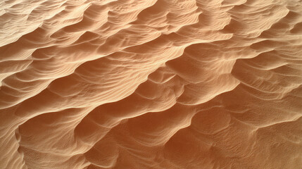 Top-down view of rippled desert sand concept. Stunning close-up of smooth, undulating desert sand dunes.