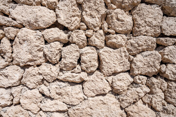 abstract part of an old fence of stone