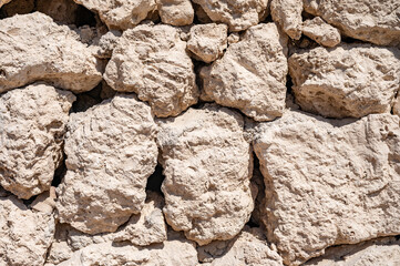 abstract part of an old fence of stone