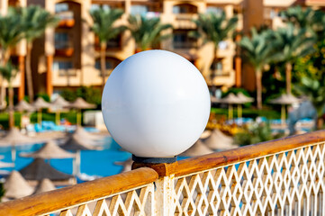 white round lights on blurred sky background with white cloud