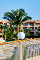 white round lights on blurred sky background with white cloud