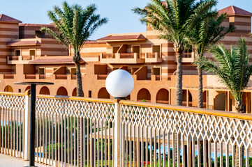 white round lights on blurred sky background with white cloud