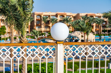 white round lights on blurred sky background with white cloud