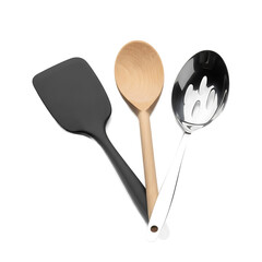 Three cooking utensils on a stark black background. Includes a black spatula, wooden spoon, and slotted ladle. The composition is simple and isolated