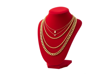 Gold necklaces on a red velvet jewelry display bust isolated on transparent background