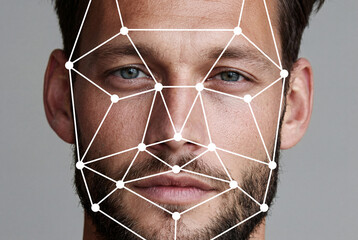 Human man face for facial recognition analysis in close-up view